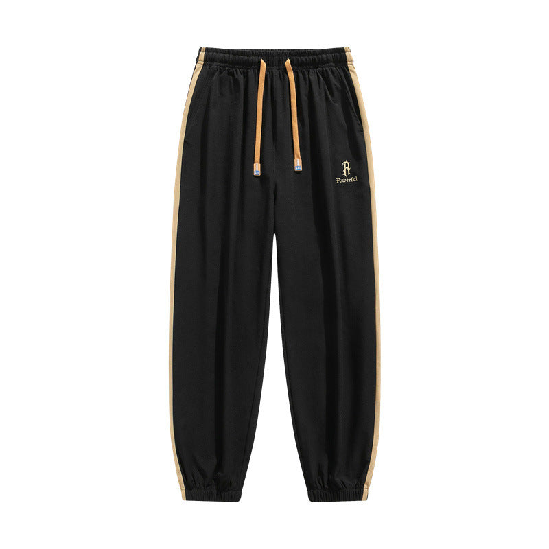 Pantalones Jogger de Corte Relajado "Urban Flow" – Estilo Versátil con Rayas Laterales