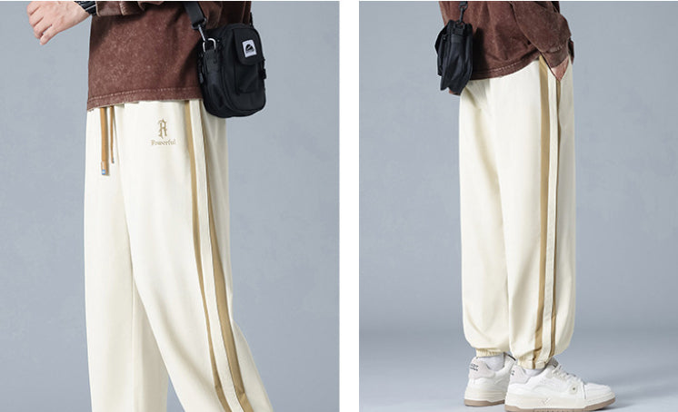 Pantalones Jogger de Corte Relajado "Urban Flow" – Estilo Versátil con Rayas Laterales