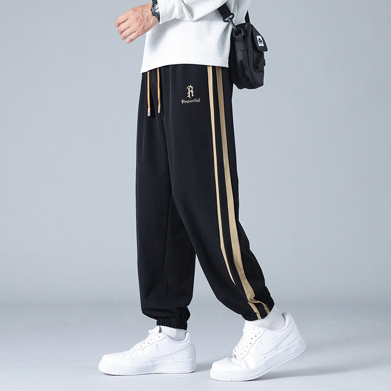 Pantalones Jogger de Corte Relajado "Urban Flow" – Estilo Versátil con Rayas Laterales